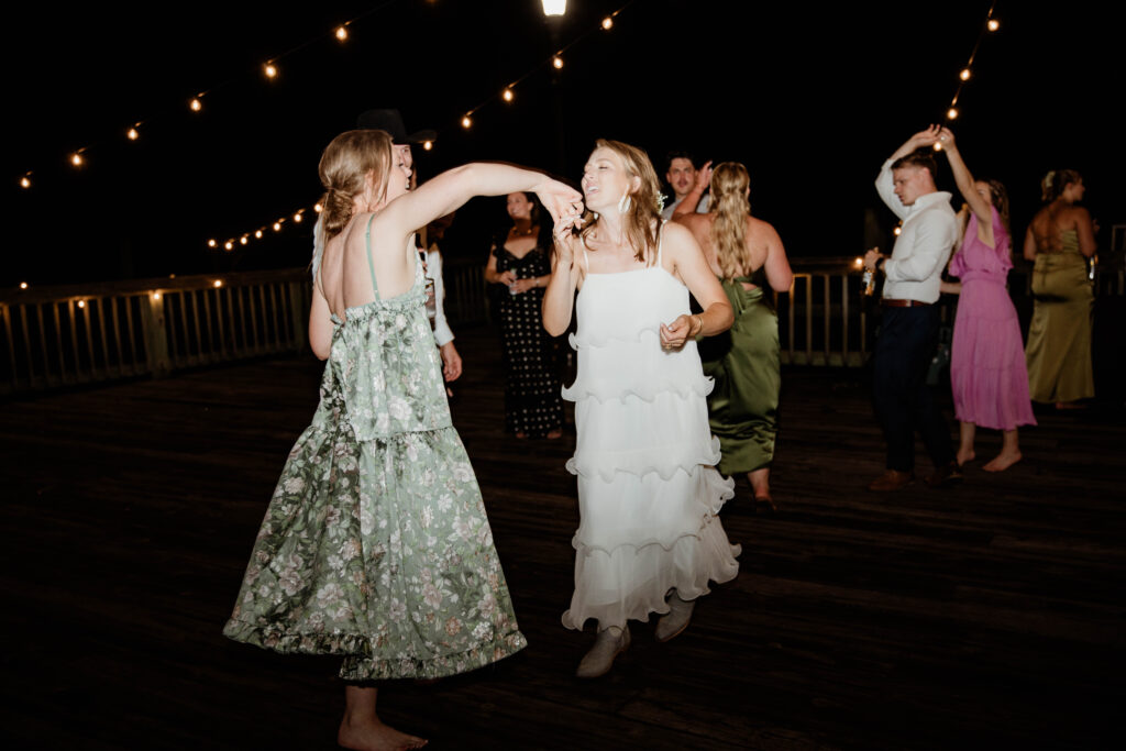 charleston bride dancing with friend